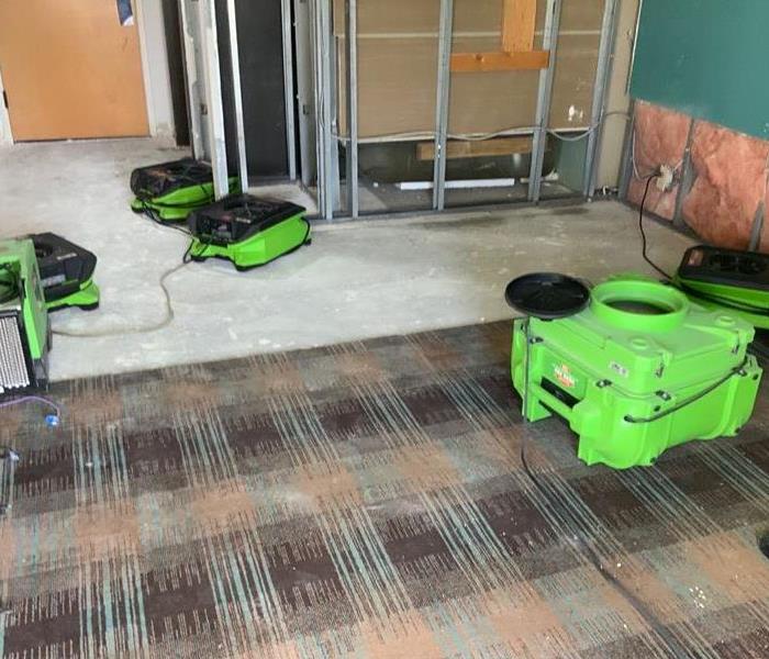 Drying equipment placed in hotel room after demolition is complete
