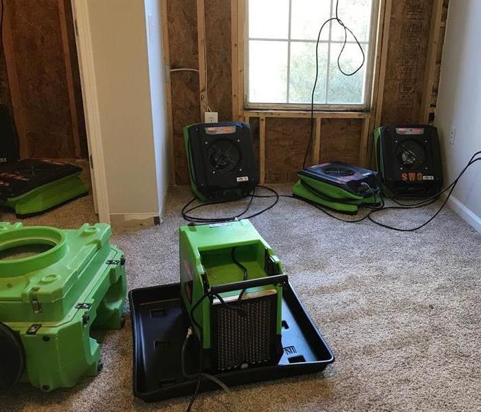 SERVPRO Green drying equipment placed in bedroom 